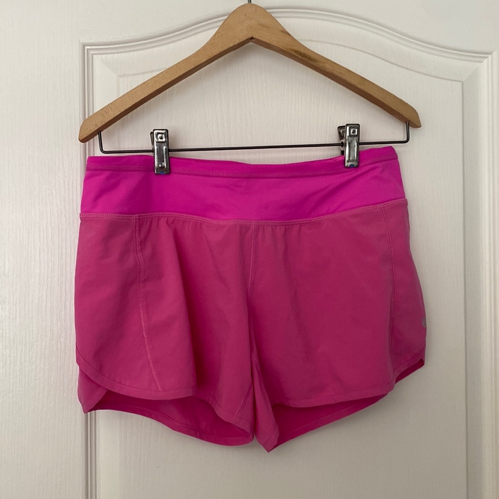 Pink lululemon speed up shorts